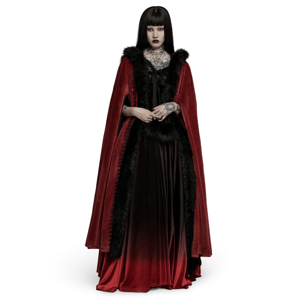 Elegant woman in a royal red velvet Gothic cloak with faux fur trim, showcasing a dramatic gothic style.
