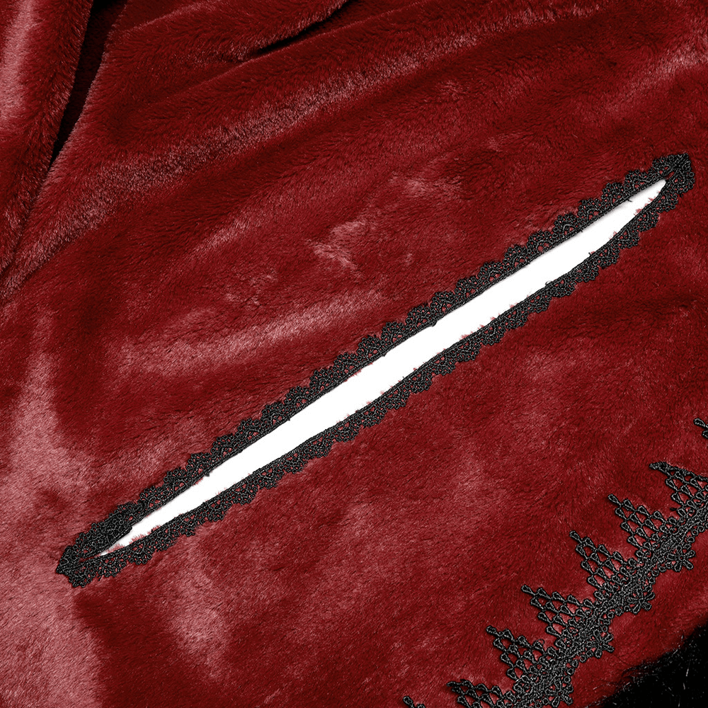Close-up of luxurious red faux fur cloak with intricate black lace detailing and stylish hand openings.