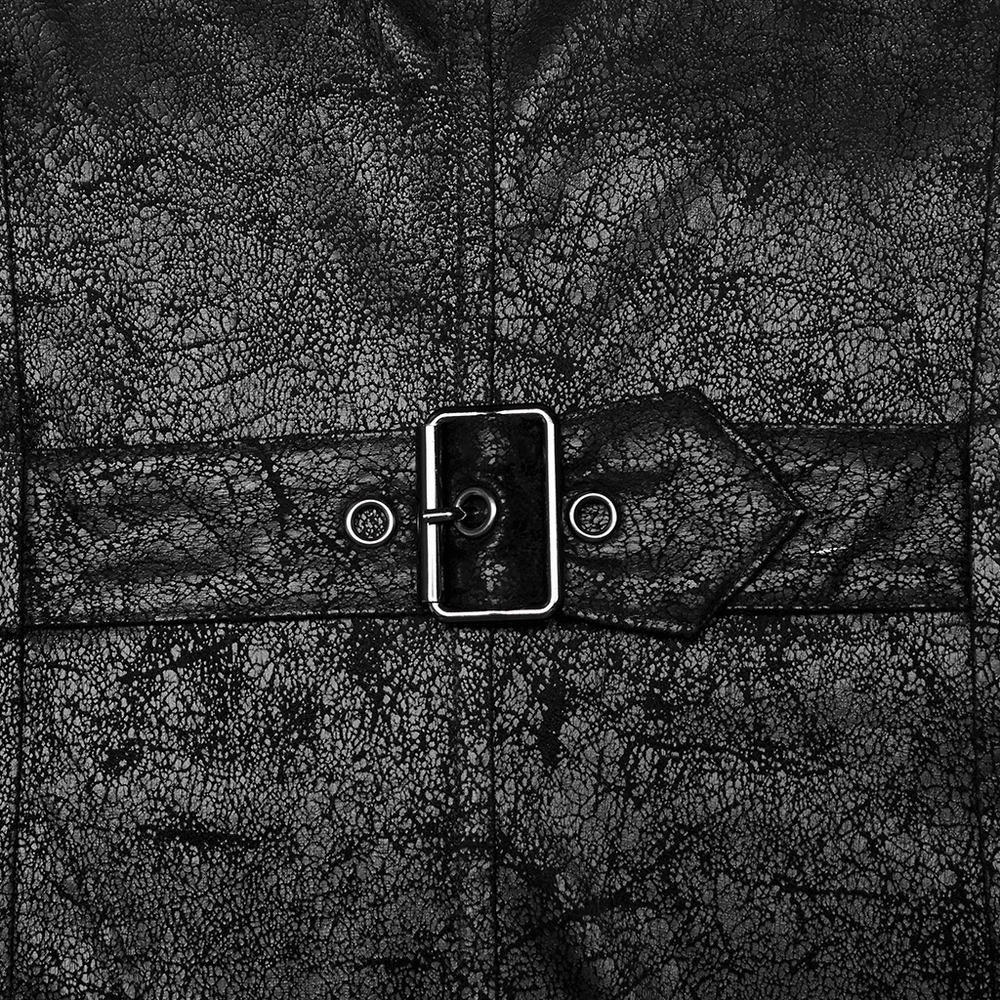 Close-up of textured black rubberized fabric with a metal buckle on a punk coat.