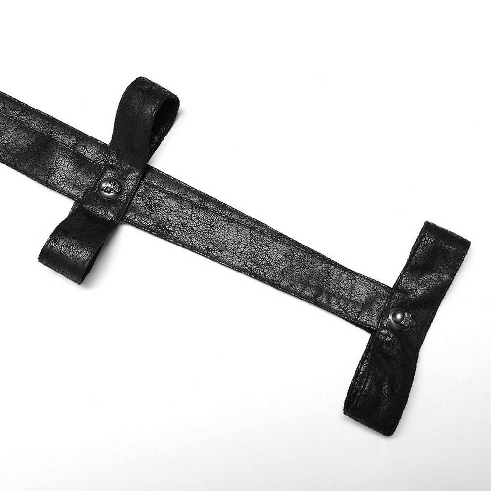 Black leather strap with decorative buttons, perfect for punk fashion statements and customizable attire.