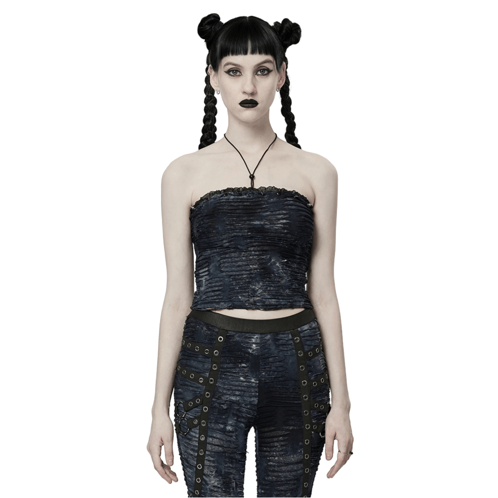 Gothic chic model in ruched bustier and matching pants, featuring lace and rivet details for a punk style.