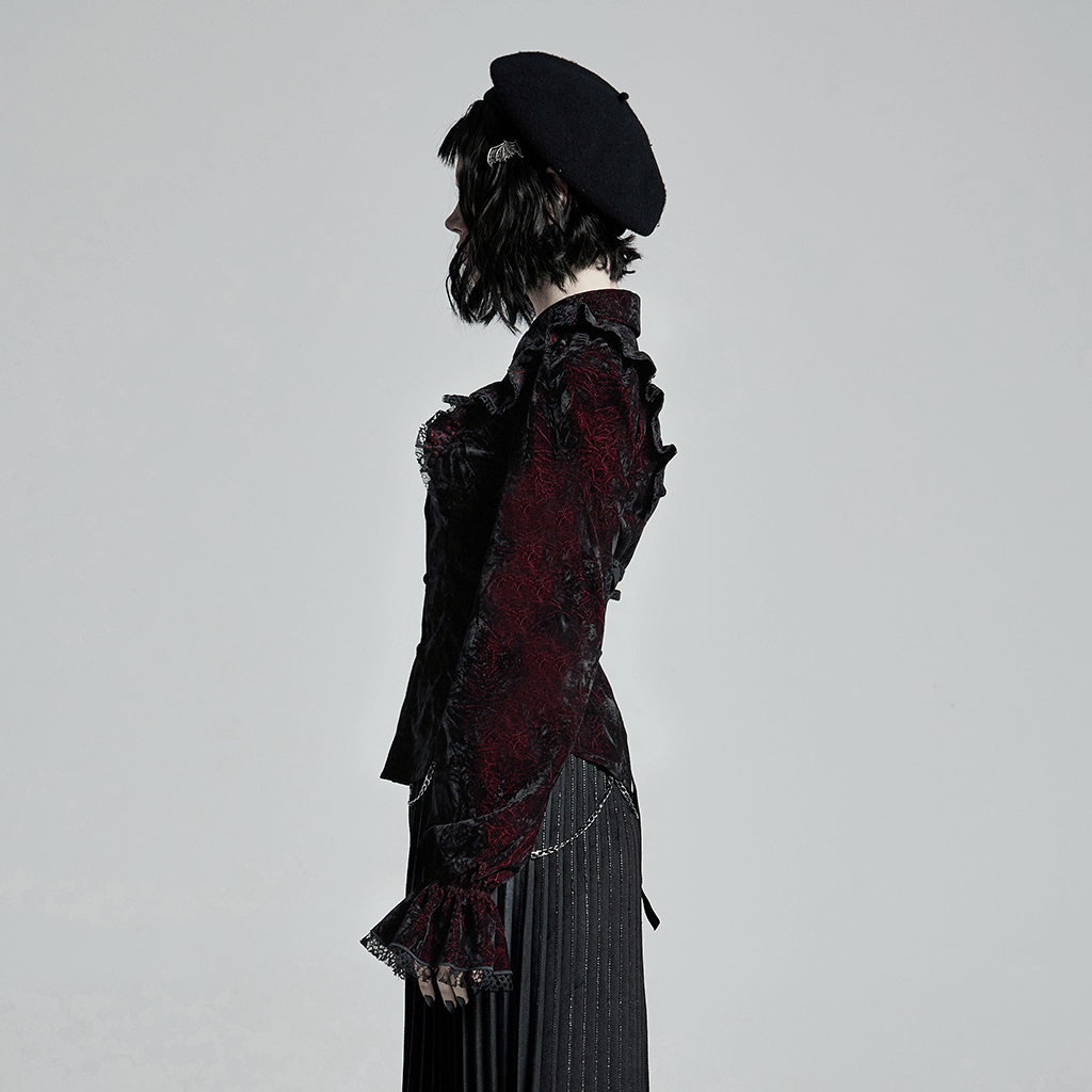 Side view of a woman wearing a ruffled velvet gothic blouse with lace-up back and a stylish beret.