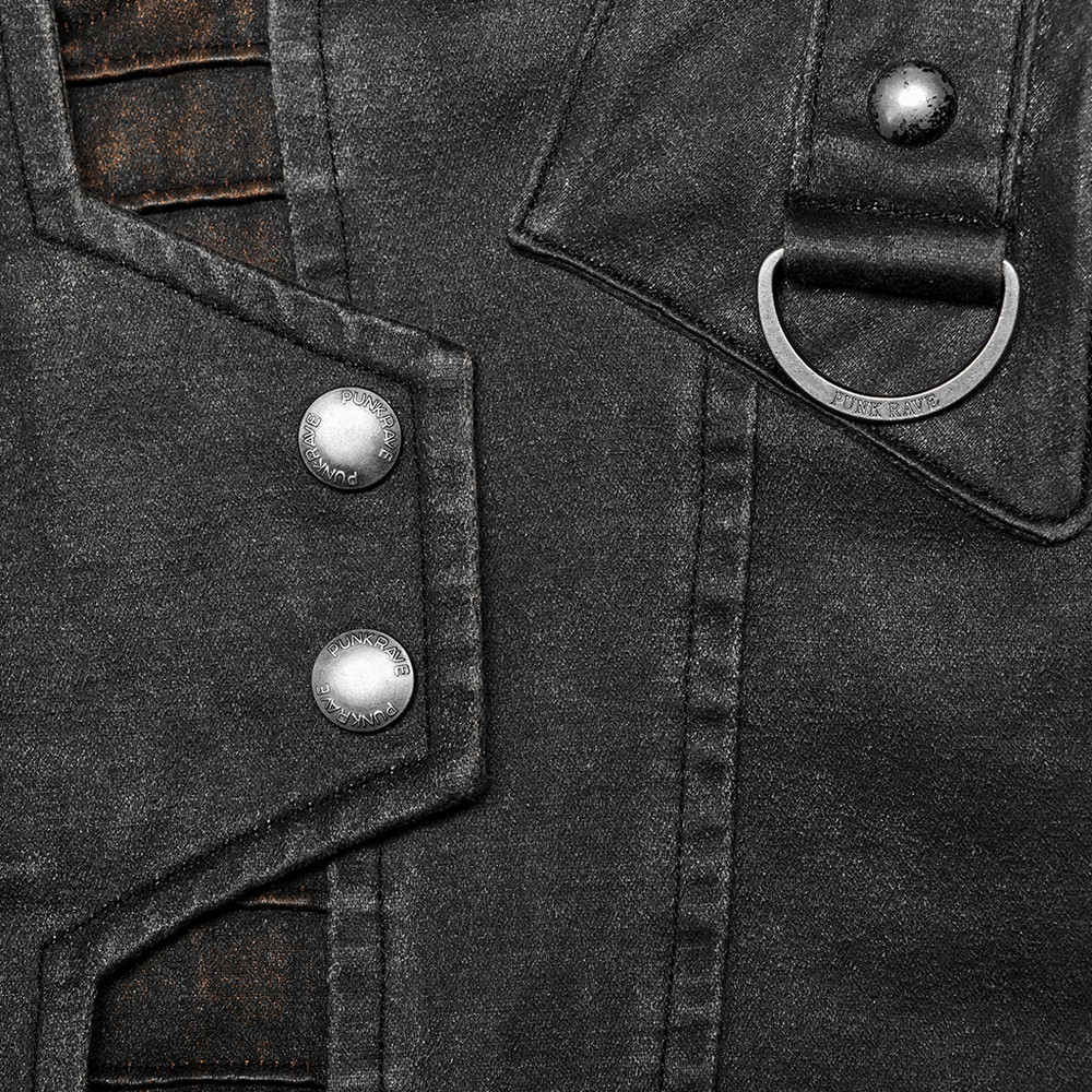 Close-up of rugged distressed leather-look jacket featuring asymmetric collar and decorative rivets.