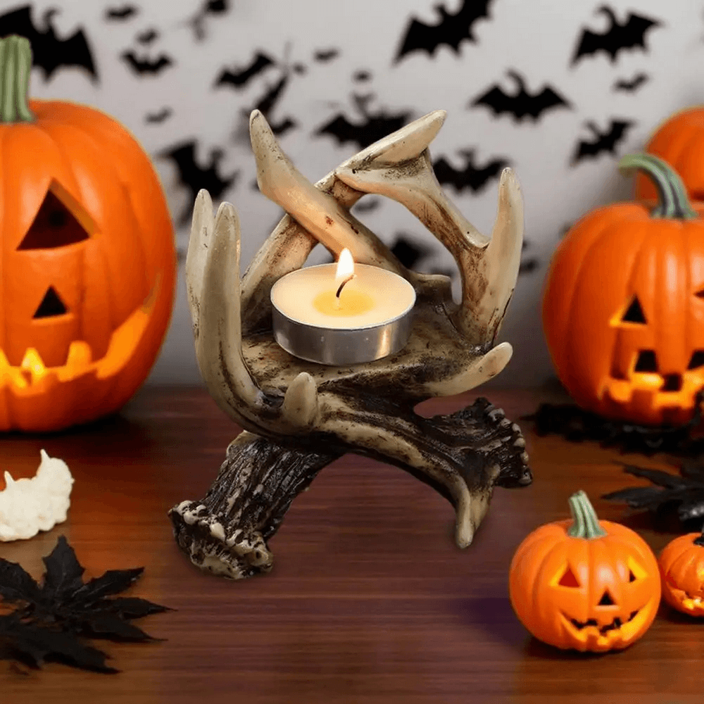 Rustic Antler Candle Holder for Gothic Home Decor showcased with pumpkins and a candle, perfect for autumn decor.