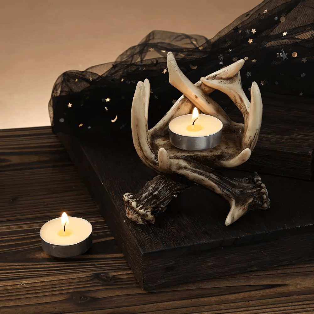 Rustic Antler Candle Holder for Gothic Home Decor with tea lights on a wooden table.