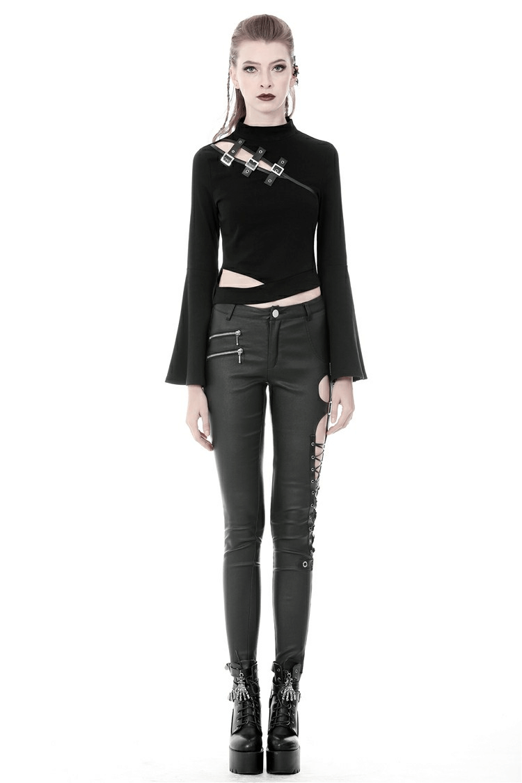 Model showcasing sexy asymmetrical skinny pants with cutout sides, lace-up details, and a punk-inspired top.