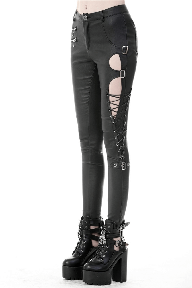 Asymmetrical skinny pants with cutout sides and lace-up detailing, perfect for a gothic punk rock look.