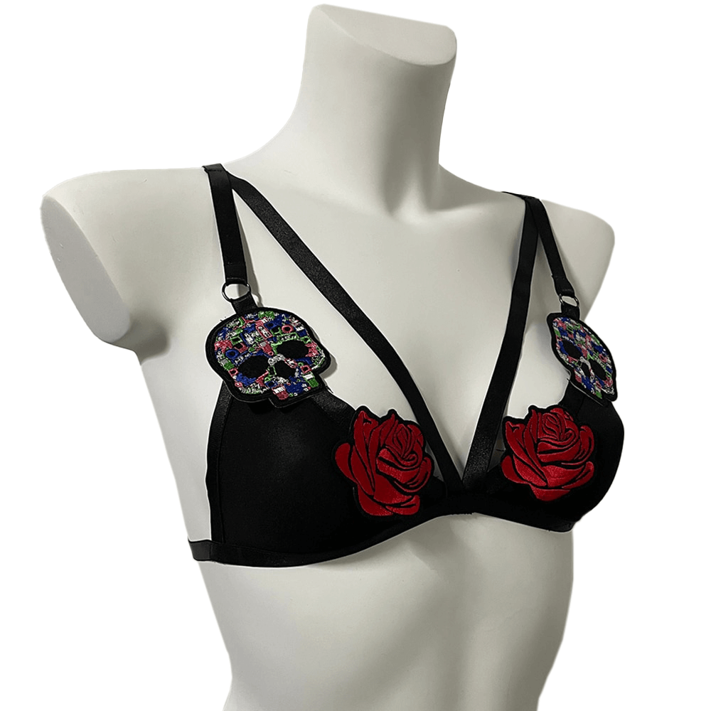Sexy black bra with red roses and skull details, featuring adjustable straps for a daring look.