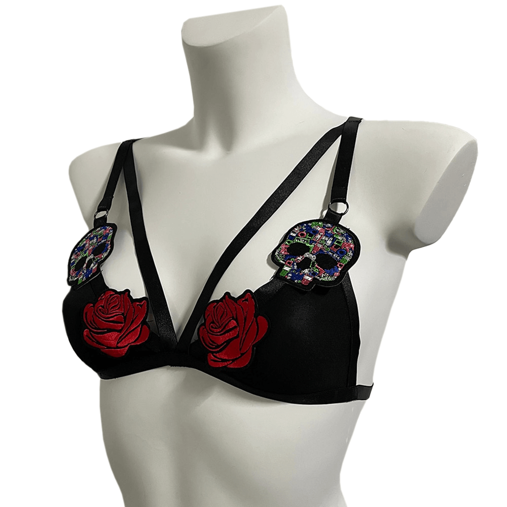 Sexy black bra with red roses and colorful skulls, perfect for seductive style and risqué fashion.