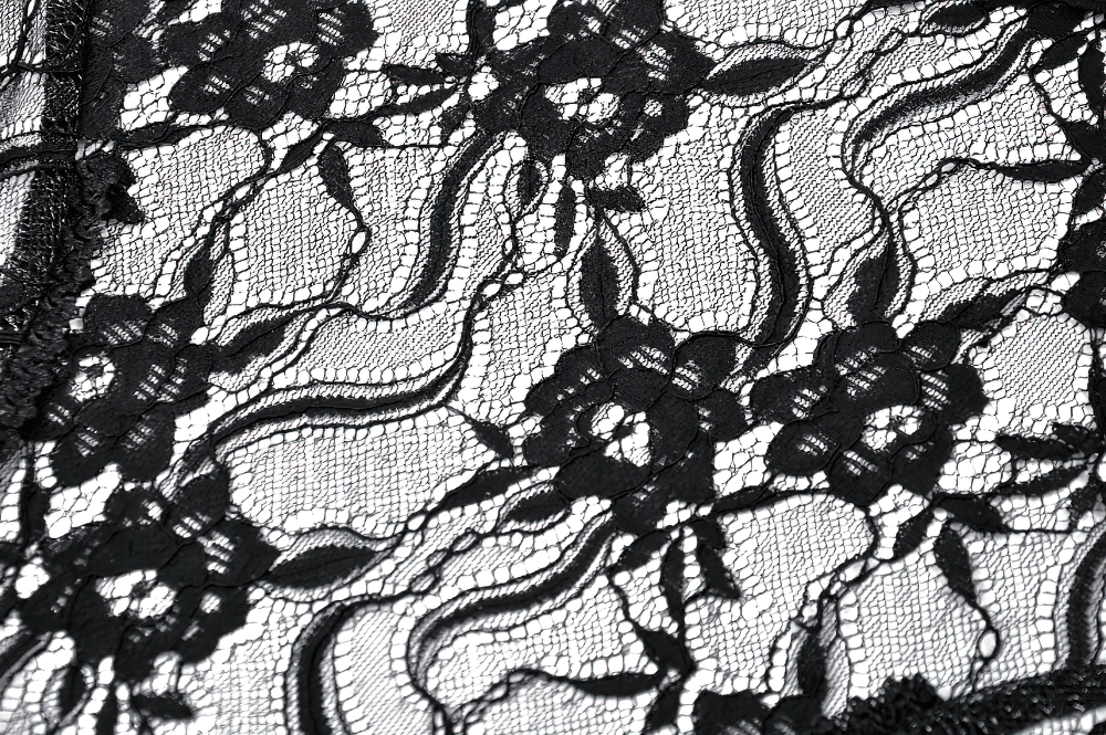 Elegant black lace fabric with intricate floral patterns, perfect for gothic-inspired evening wear.