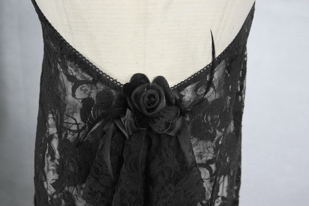 Elegant black lace night dress back detail with floral bow and open back for a gothic chic look.