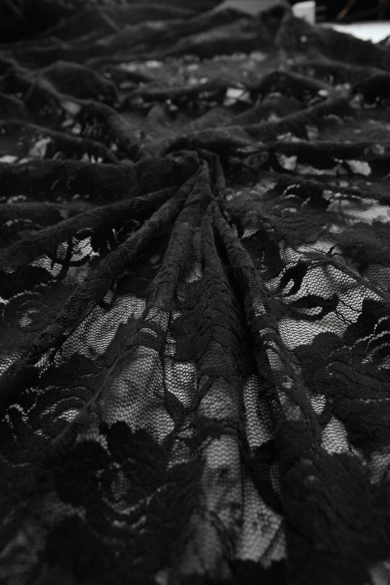 Black lace fabric beautifully draping, perfect for a sexy night dress with gothic elegance.