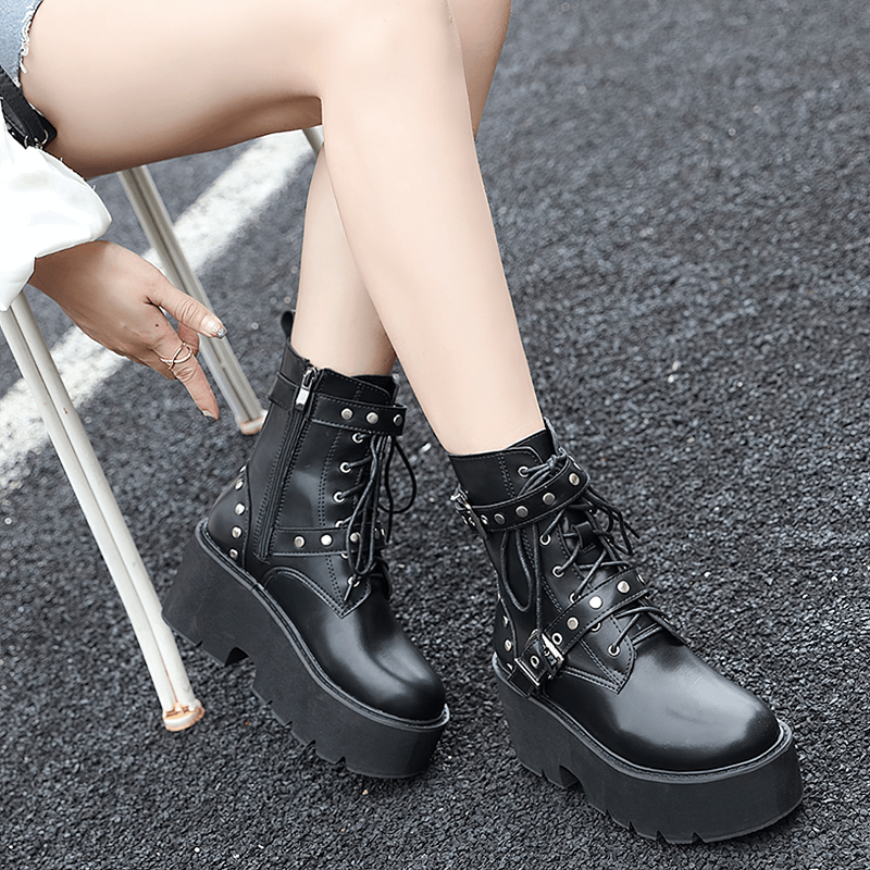 Stylish black PU leather combat boots with rivets and high platform, perfect for steampunk fashion and alternative outfits.