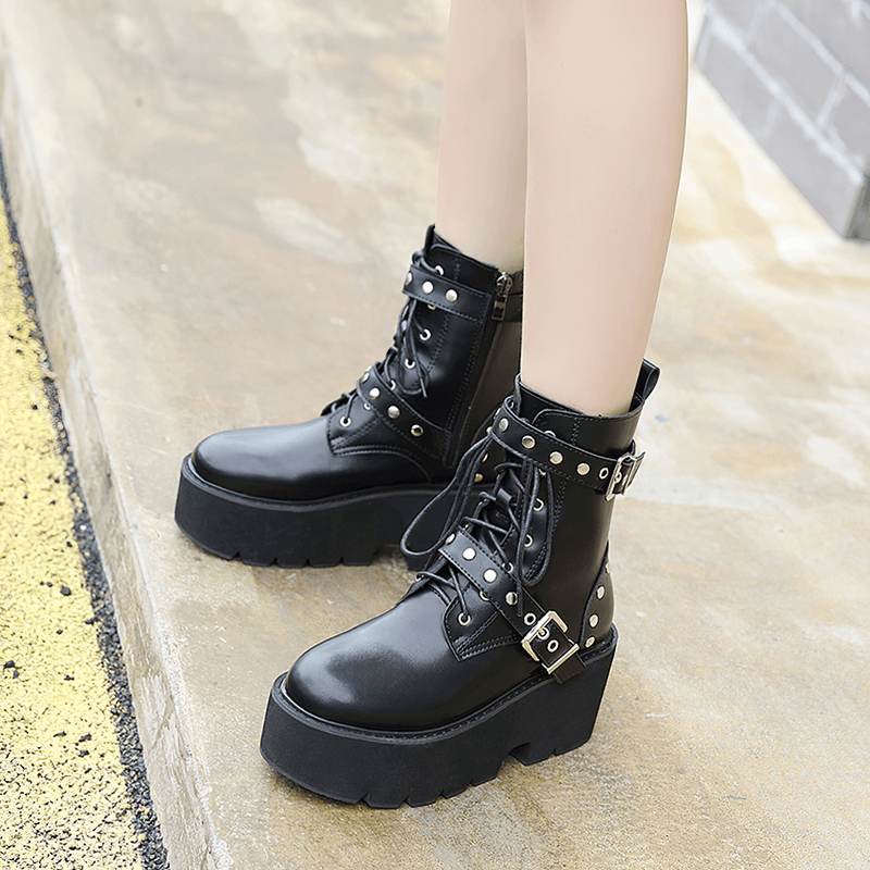 Sexy black PU leather women's combat boots with rivets and platform sole for steampunk style fashion.
