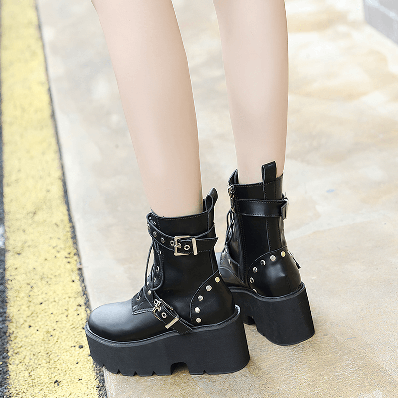 Trendy black PU leather women's combat boots with rivets and buckles, perfect for steampunk and alternative fashion.