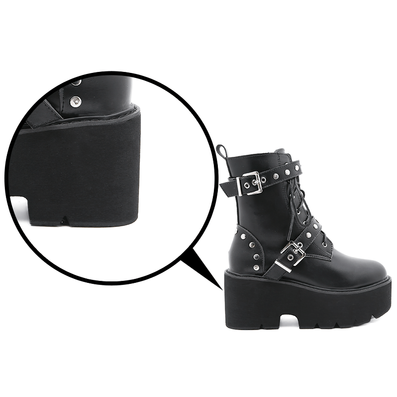 Close-up of sexy black PU leather combat boots with rivets, showcasing the stylish platform and unique detailing.