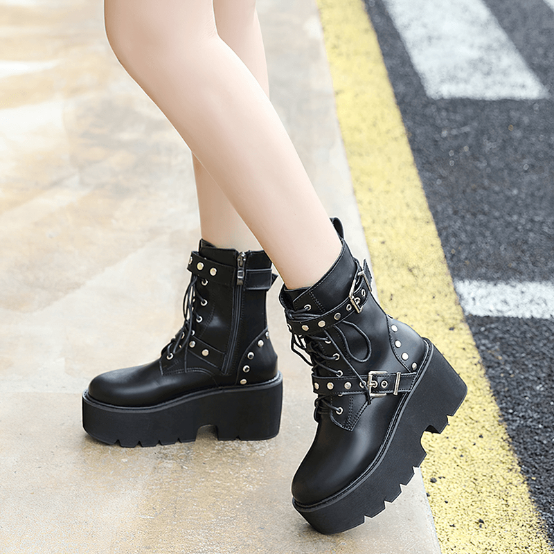 Stylish black PU leather women's combat boots with rivets and platform heels, perfect for steampunk and alternative fashion.
