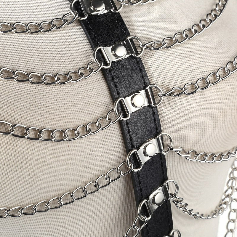 Close-up of a women's Gothic body chest harness with zinc alloy chains, perfect for alternative fashion styling.