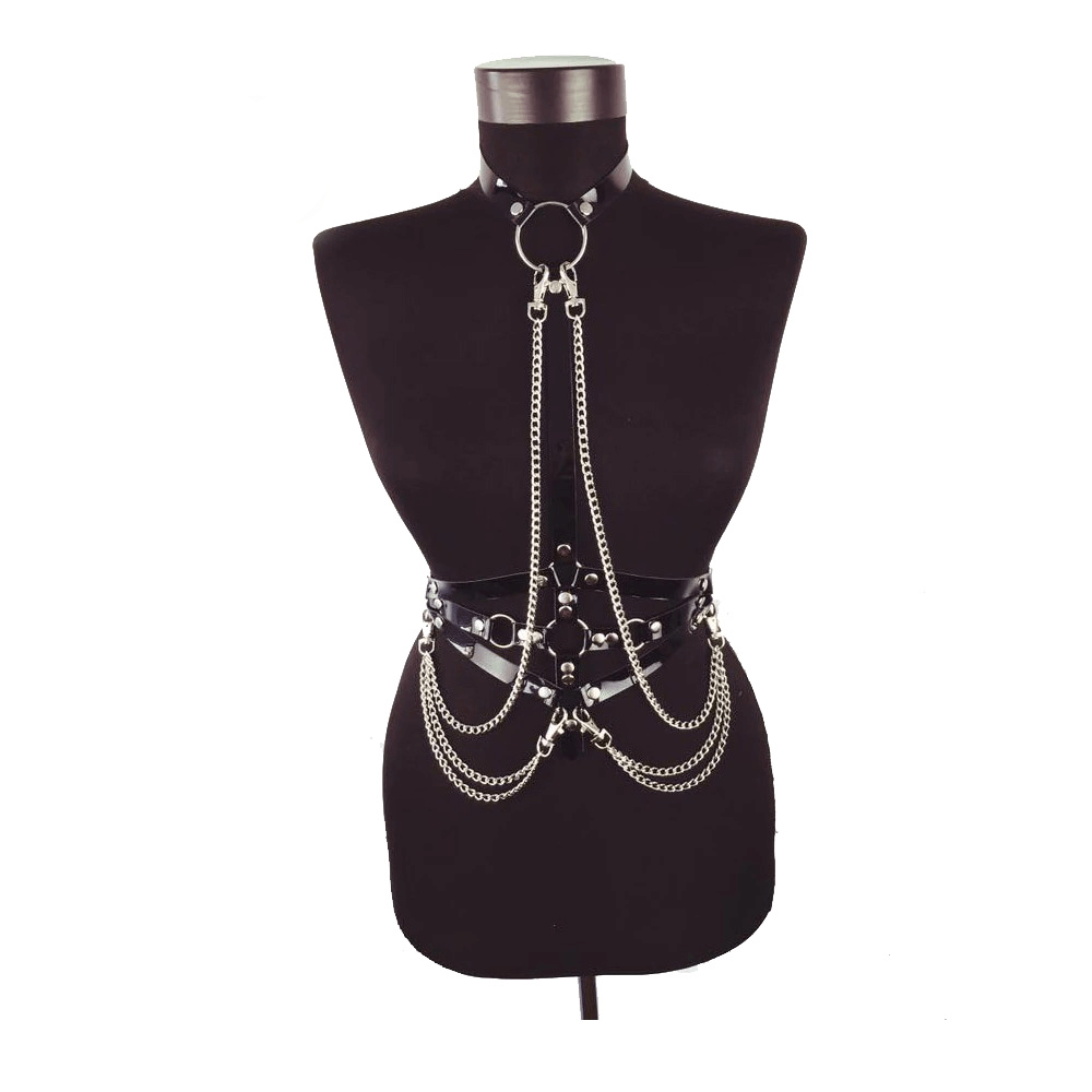 Stylish gothic body harness in black PU leather with chains and rings for women, perfect for cosplay or fashion.