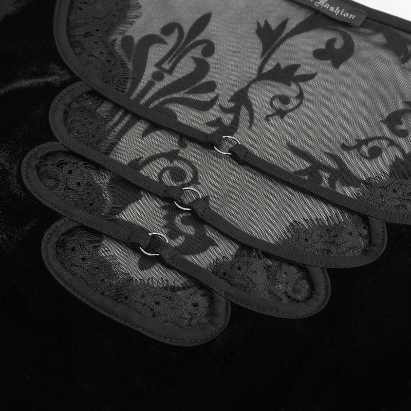 Detail view of black lace top showcasing vintage floral pattern and elegant flared sleeves, perfect for a chic look.