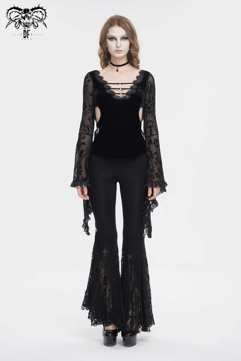 Elegant woman wearing a sexy deep v-neck lace top with flared sleeves and black pants, exuding vintage floral charm.
