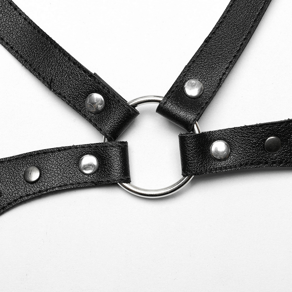 Punk faux leather harness with metal rings and spikes, edgy harness for a rockstar look, adjustable studded design.