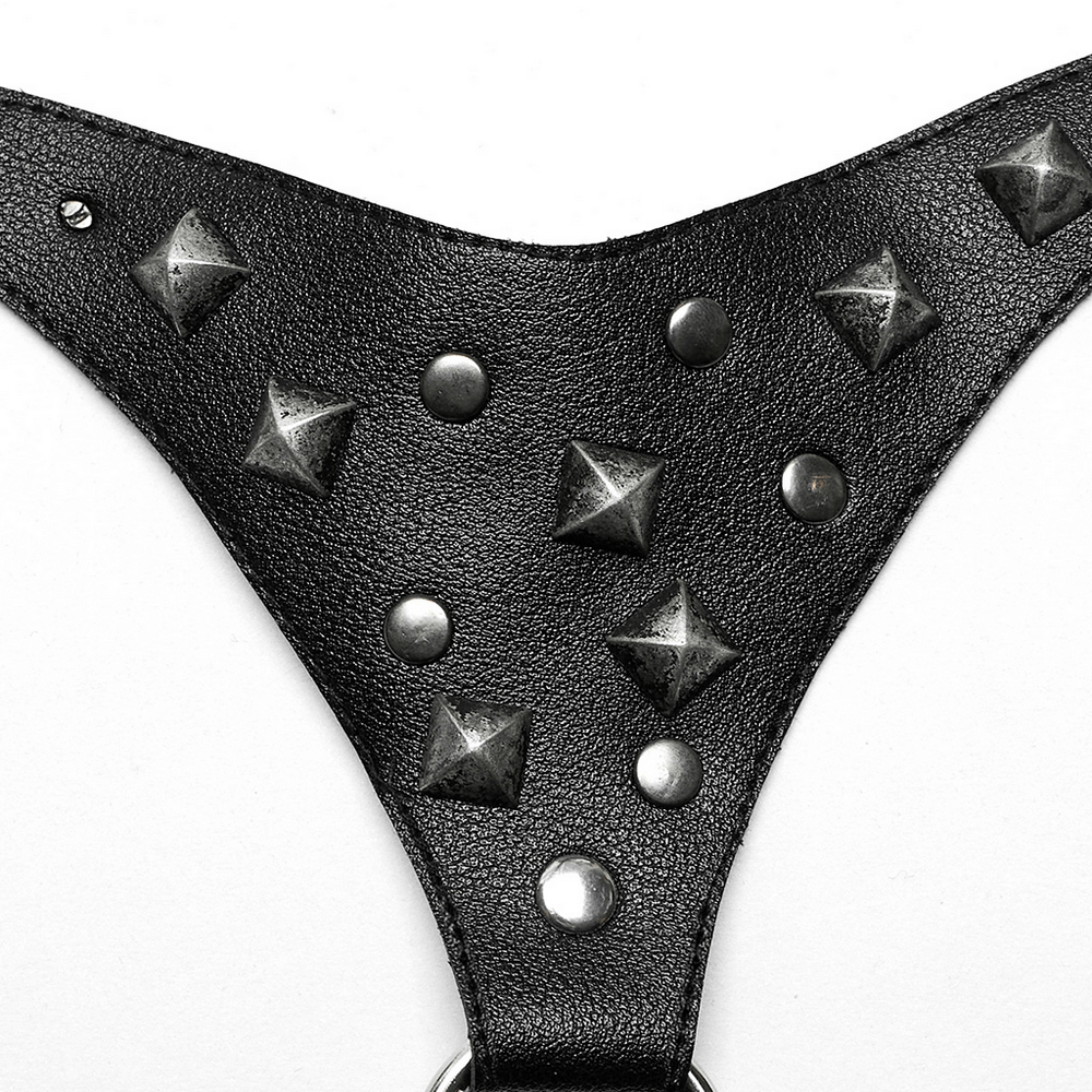 Studded black faux leather punk harness with spikes and rivets, showcasing rebellious style for the rockstar in you.