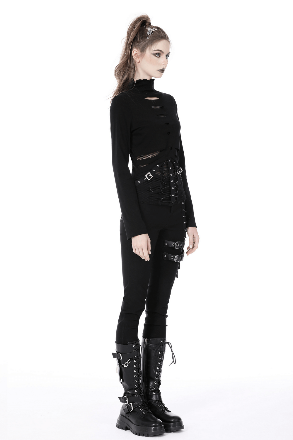 Edgy black fishnet sweatshirt with punk hardware details, styled with matching black pants and chunky combat boots.