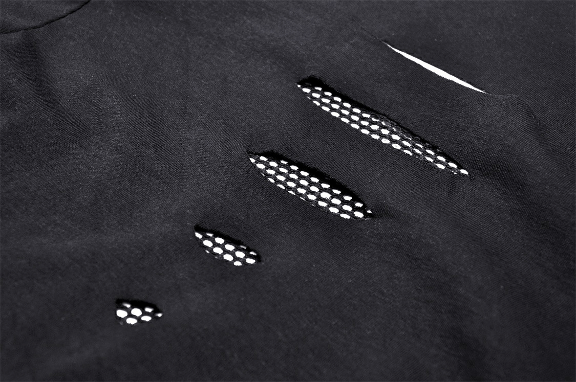 Close-up of black fishnet sweatshirt showcasing edgy mesh panels and stylish cutouts for a punk rock aesthetic.