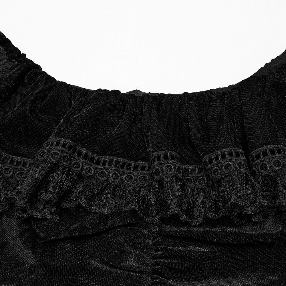 Close-up of ruffled collar on a sexy goth mesh dress in black velvet. Elegant and alluring detail.