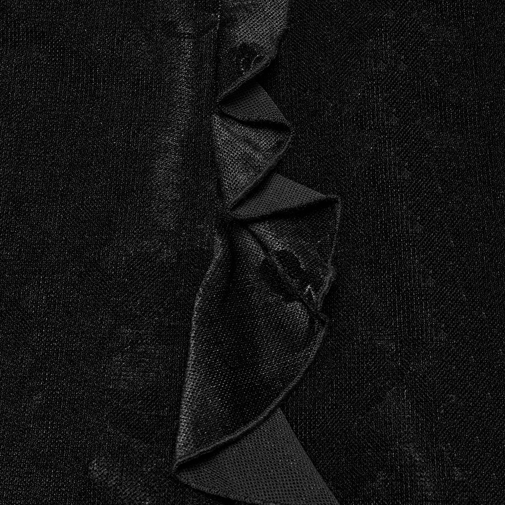 Close-up of the ruffled detail on a sexy goth mesh dress showcasing sheer velvet texture.
