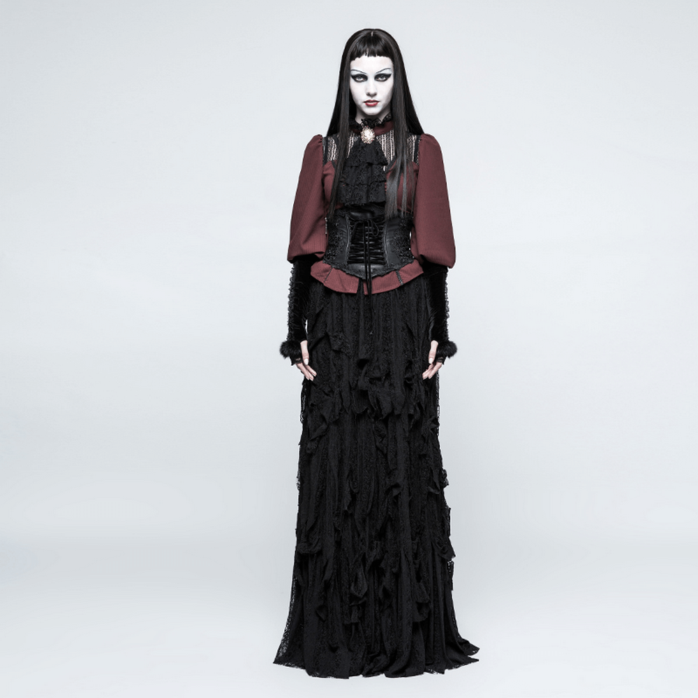 Model in a black Victorian-style dress with a red bodice and corset, showcasing dark romantic fashion.