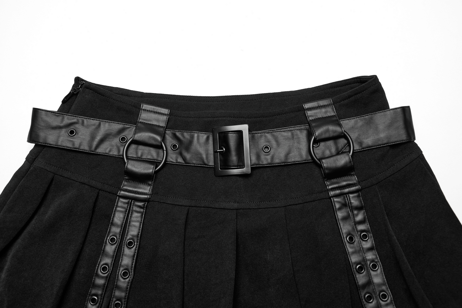 Close-up of a black pleated mini skirt featuring a faux leather belt with eyelet details from Punk Rave.