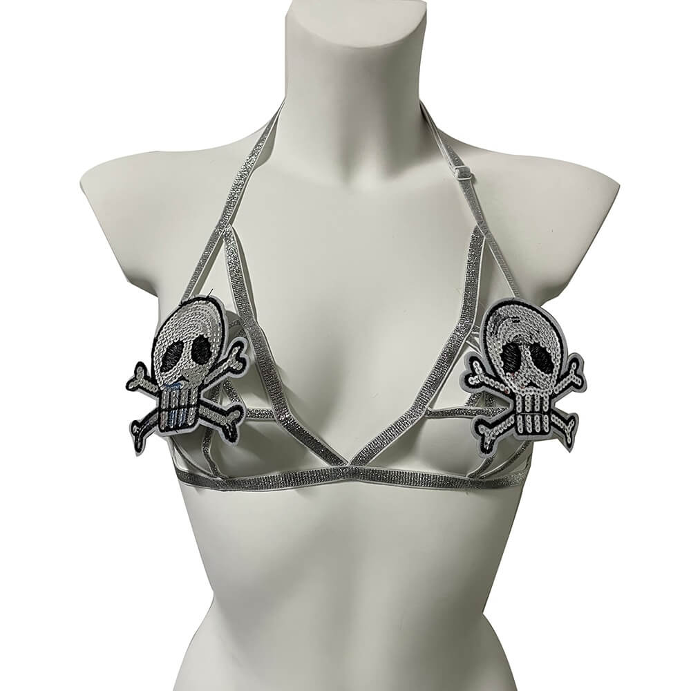 Sexy gothic body harness bra with skull and crossbones design, ideal for bold fashion statements.