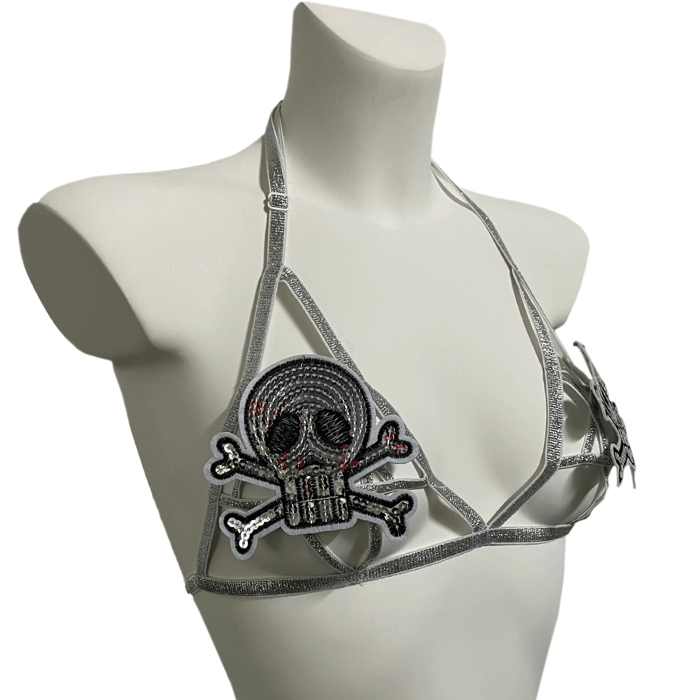 Gothic body harness bra featuring metallic skull and crossbones design, perfect for adding an edgy allure to your outfit.