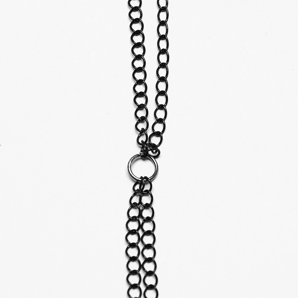 Close-up of elegant black aluminum chain link, designed for a gothic chest chain accessory.