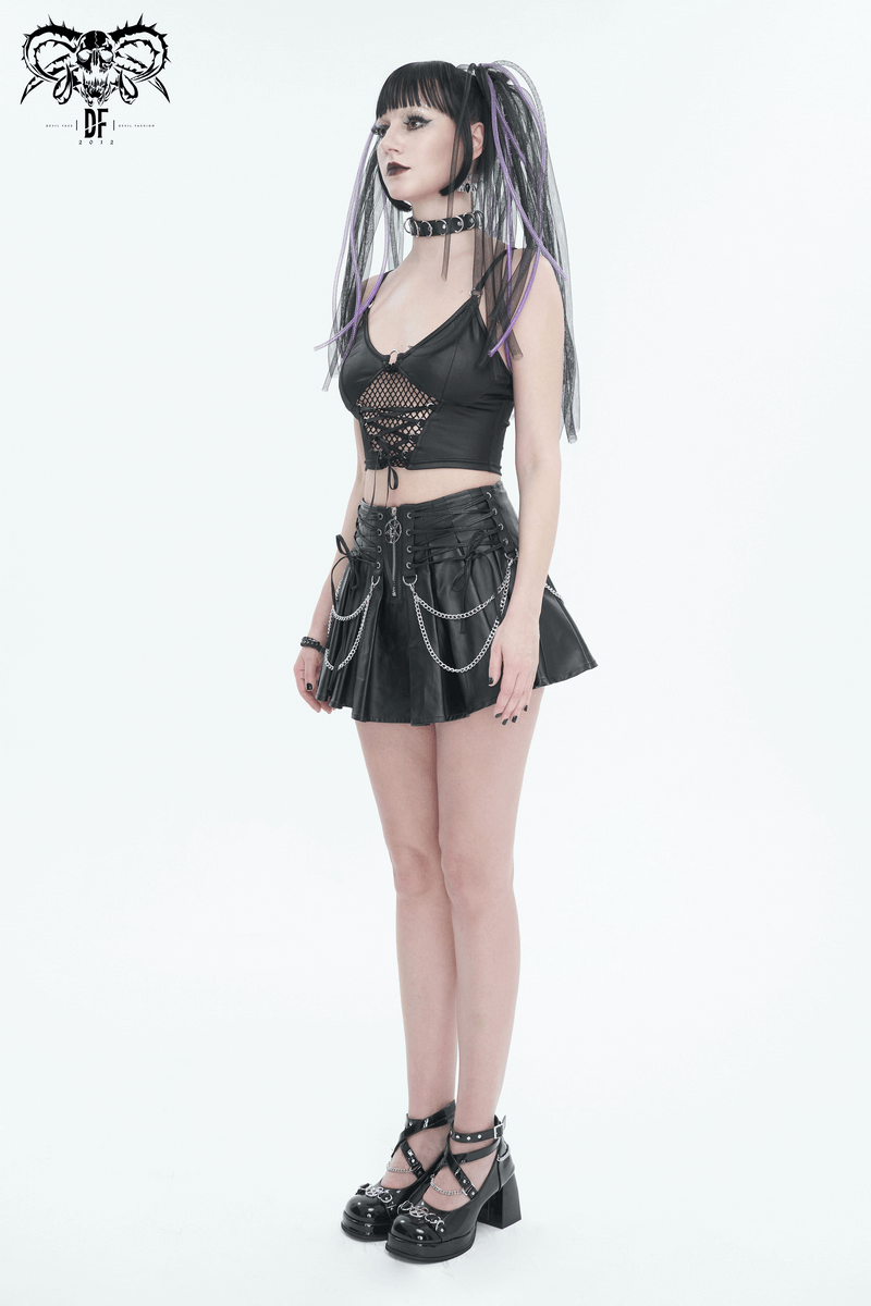Model showcasing a sexy grunge crop top with lace-up net front and a stylish black skirt, perfect for bold fashionistas.