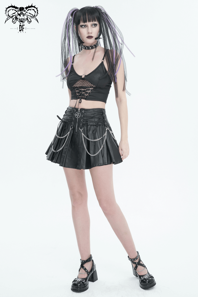 Edgy woman in a black lace-up grunge crop top and pleated skirt, showcasing bold fashion with unique style.