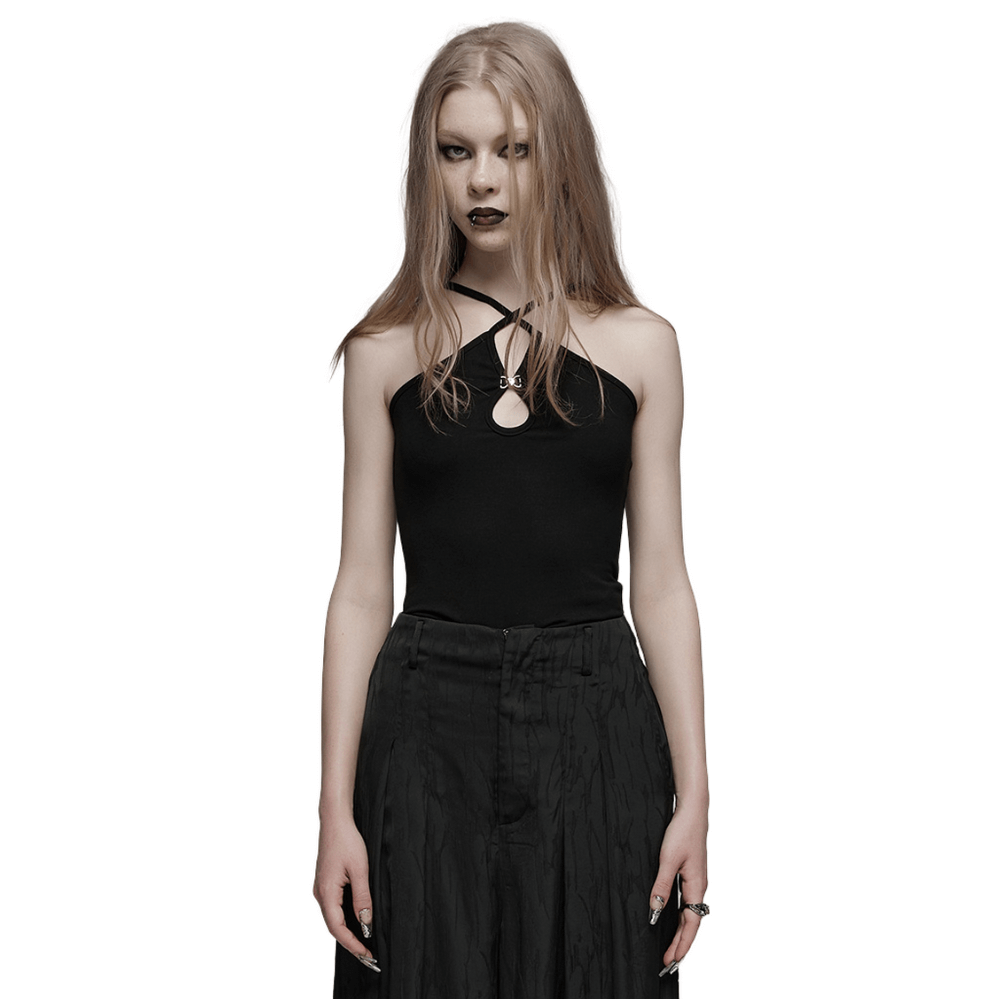 Model wearing a sexy black halter camisole with metal buckle detailing, showcasing a daring waterdrop cutout.