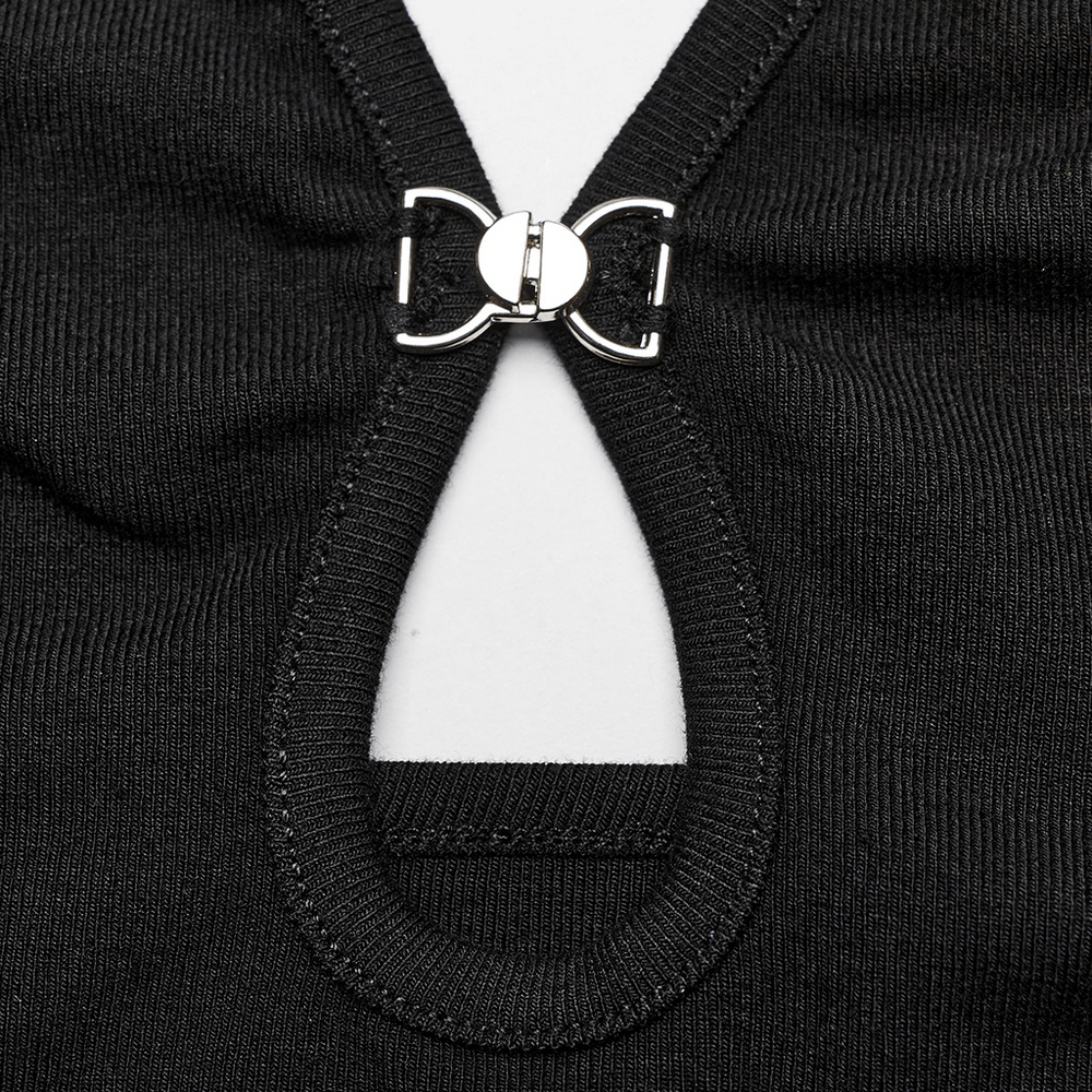 Close-up of black halter camisole with daring waterdrop cutout and stylish metal buckle detailing.