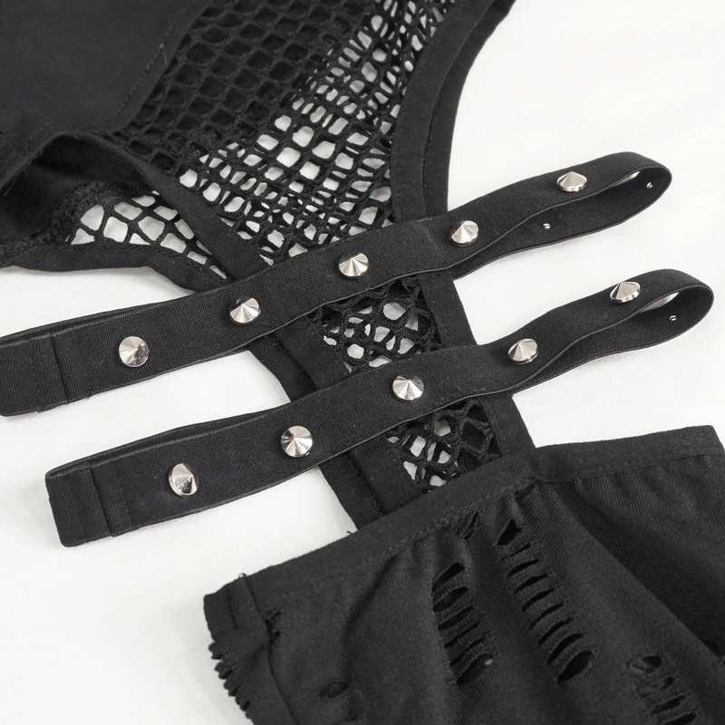 Close-up of sexy black leggings featuring a hole net design and metal studded straps for an edgy look.