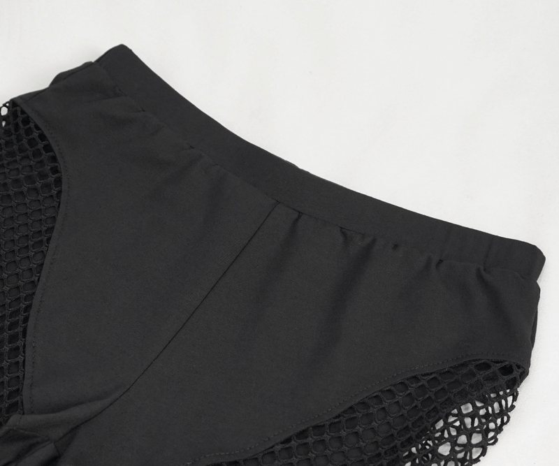 Close-up of sexy black hole net leggings for women, showcasing the elastic waistband and unique net design.