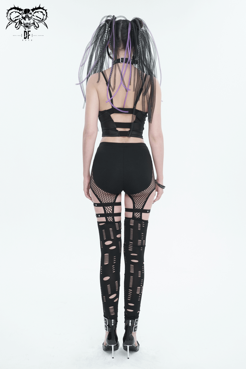 Woman from behind wearing sexy black hole net leggings and a cropped top with edgy hair accessories.