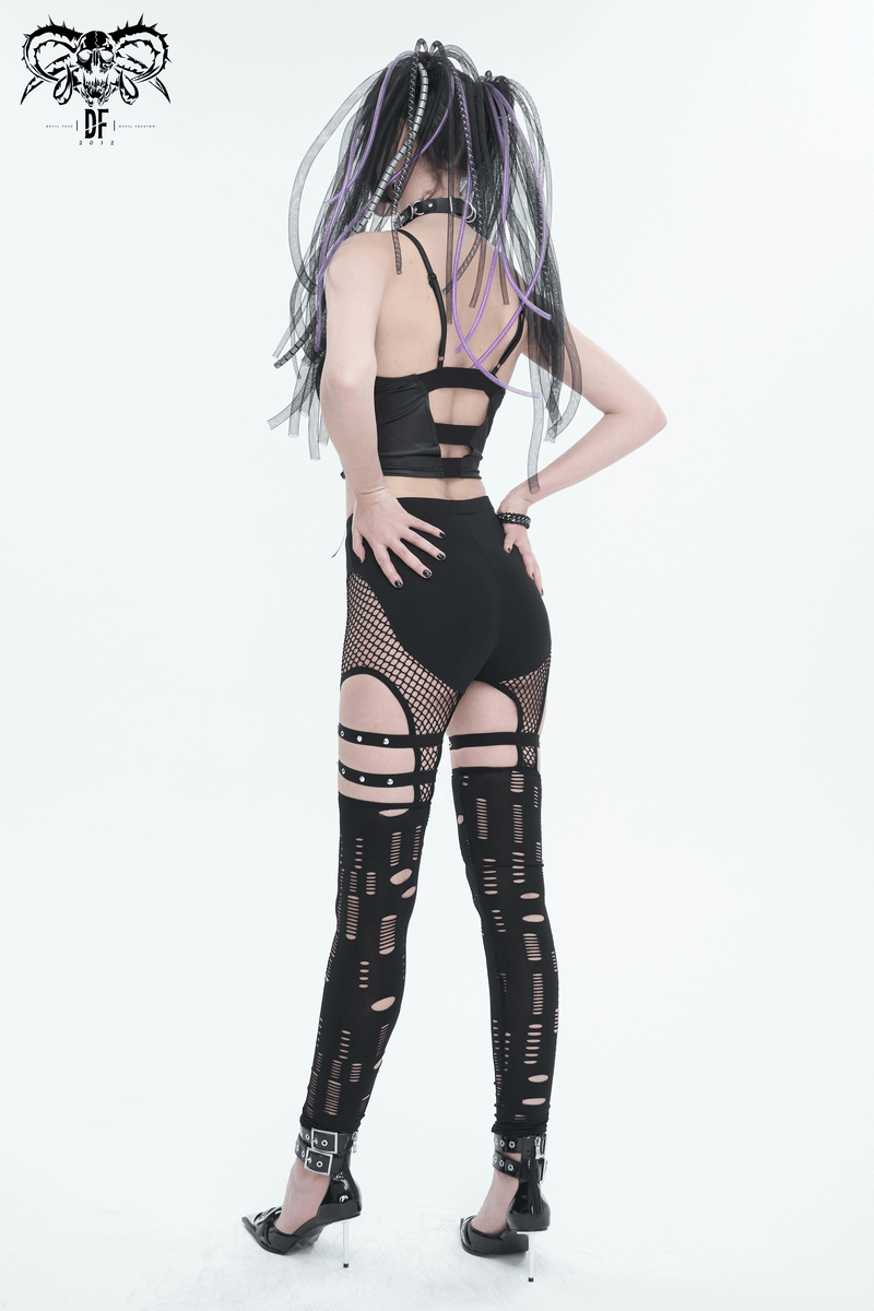 Woman showcasing sexy hole net slim leggings with metal studded accents, perfect for a gothic punk rock style.