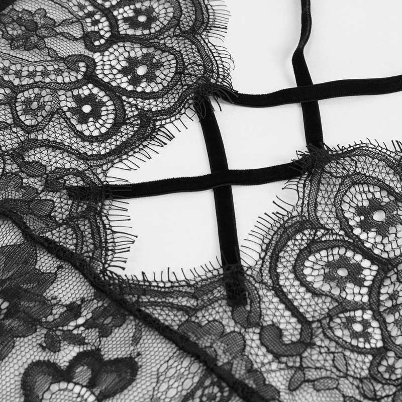 Close-up of elegant black lace fabric with intricate patterns, perfect for a gothic style dress.
