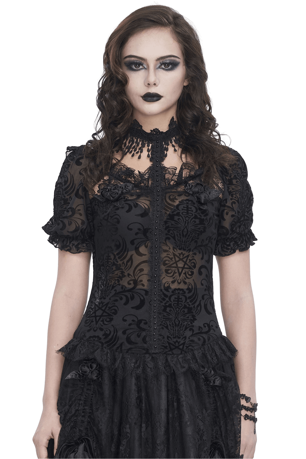 Chic black lace blouse with puff sleeves and fringe detail, perfect for elegant day-to-night looks.