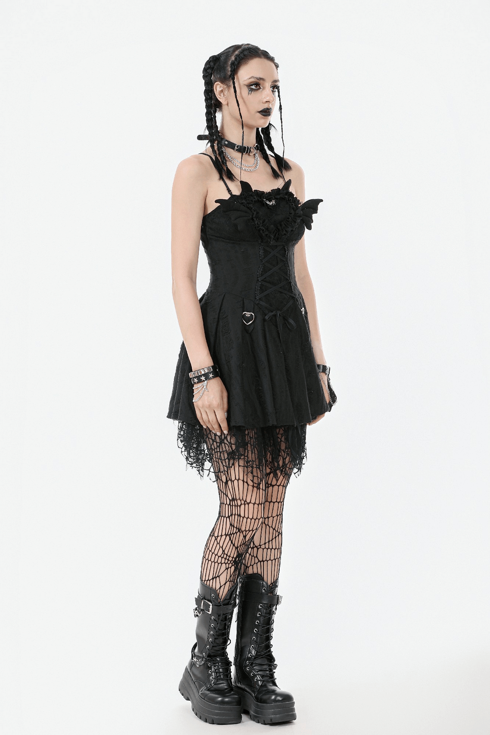 Sexy lace corset dress featuring heart clips and a chic mesh hem, paired with edgy accessories and stylish fishnet stockings.
