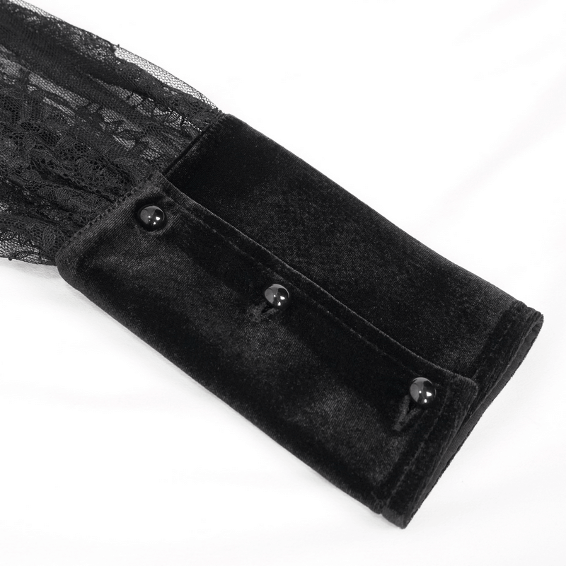 Close-up of black puff sleeve blouse cuff featuring transparent lace, elegant buttons, and soft fabric texture.