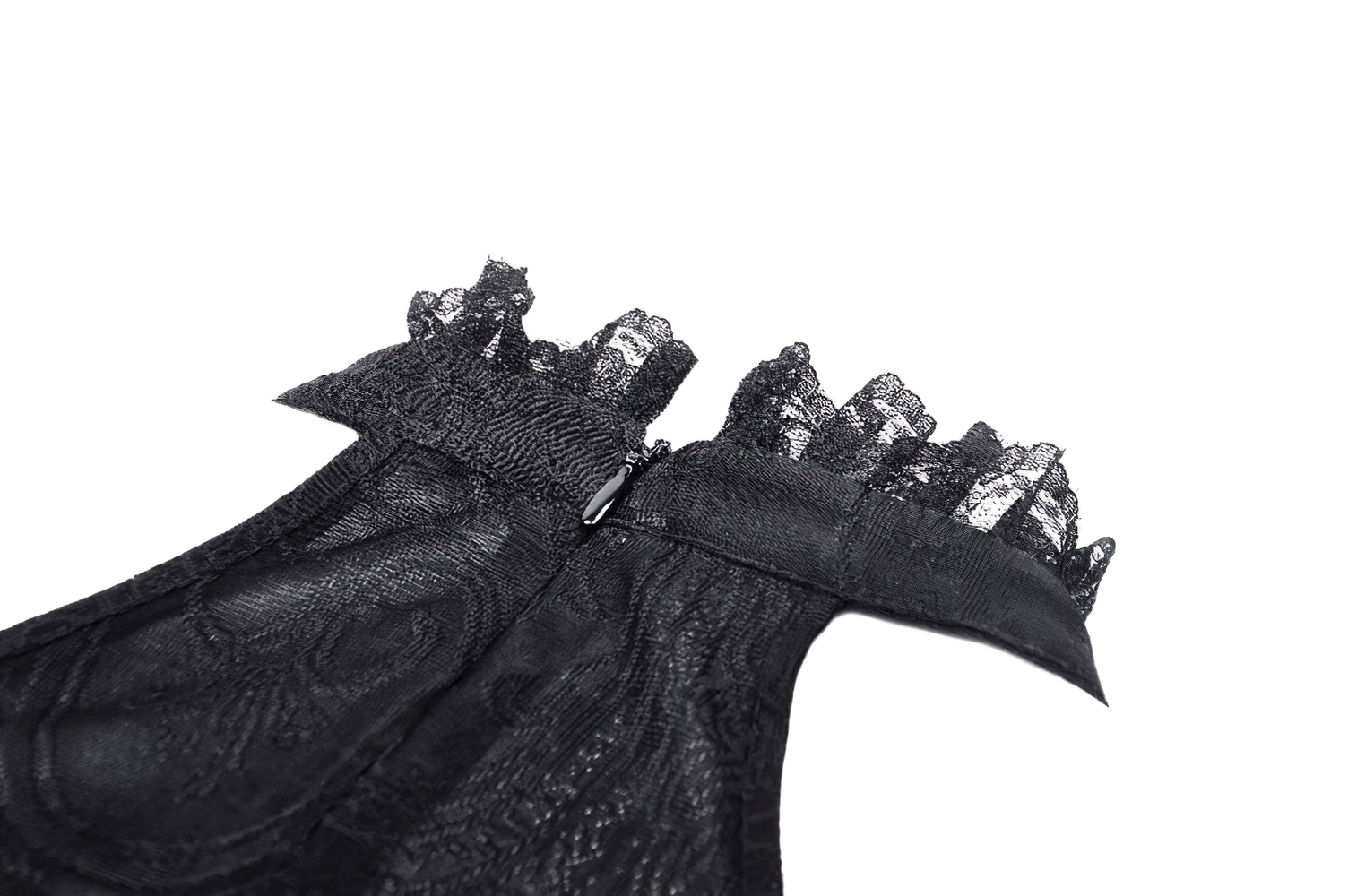 Close-up of the gothic black lace dress showing intricate lace trim and zipper detail on the back.