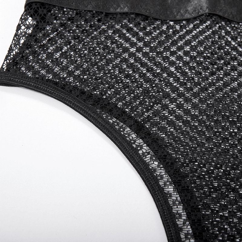 Close-up of a black lace bodysuit highlighting intricate patterns and sheer fabric, perfect for seductive lingerie wear.